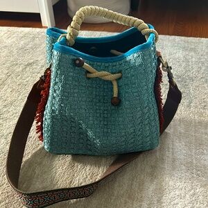Italian raffia handbag with rope handle and long shoulder strap.